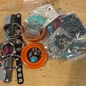 Orange trinket dish with fun jewelry